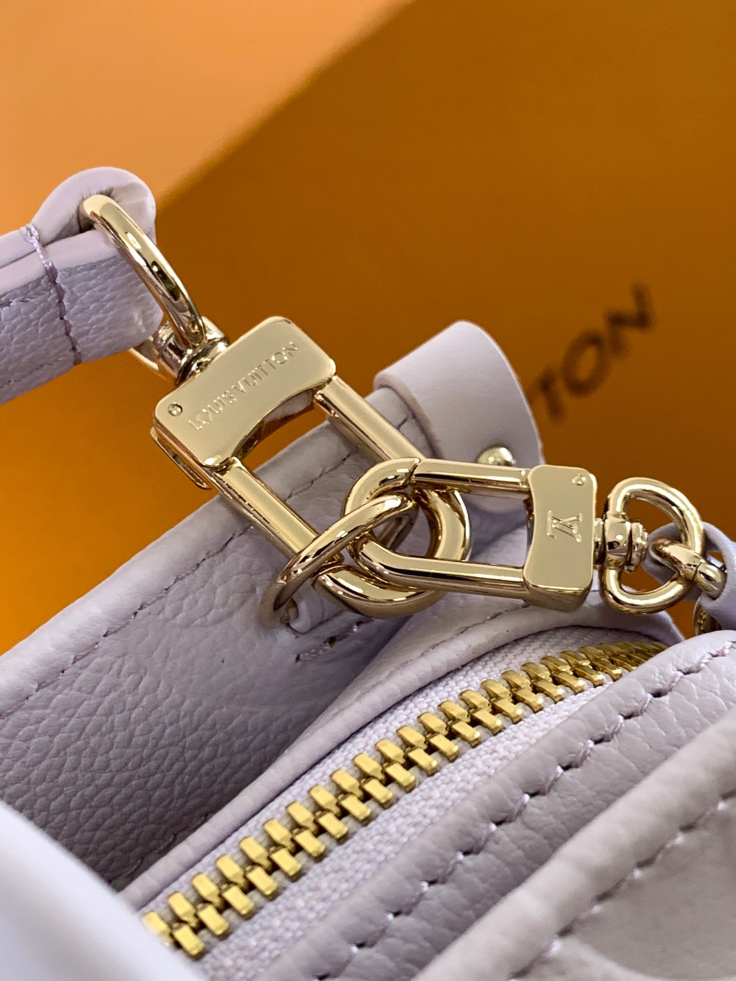 LOUIS VUITTON LV 25S ONTHEGO EAST WEST BAG 25 IN LIGHT LAVENDER CALFSKIN MONOGRAM EMPREINTE