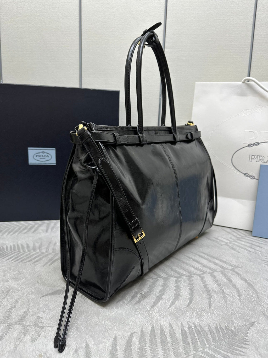 PRADA TOTE BAG WITH BELT 42 IN BLACK OIL WAX LAMBSKIN GOLD HARDWARE