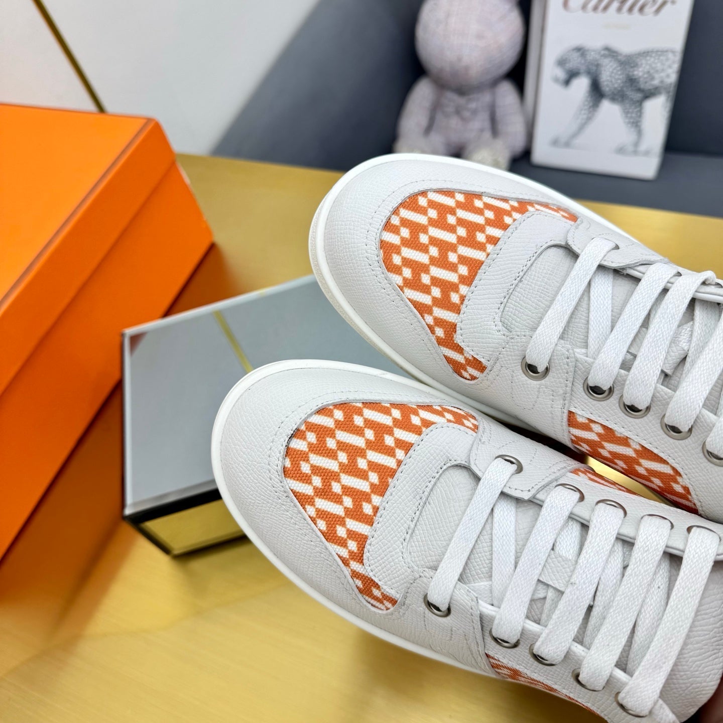 HERMES FREE SNEAKER IN WHITE CALFSKIN AND "H EN BIAIS" ORANGE CANVAS