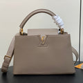 LOUIS VUITTON CAPUCINES MM 31 IN KHAKI BROWN TAURILLON