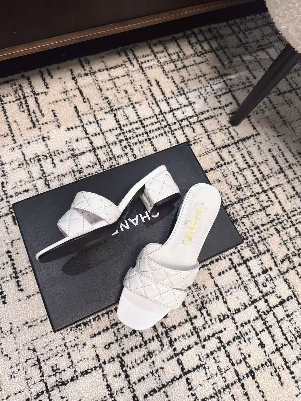 CHANEL MID HEEL MULES IN WHITE SHEEPSKIN